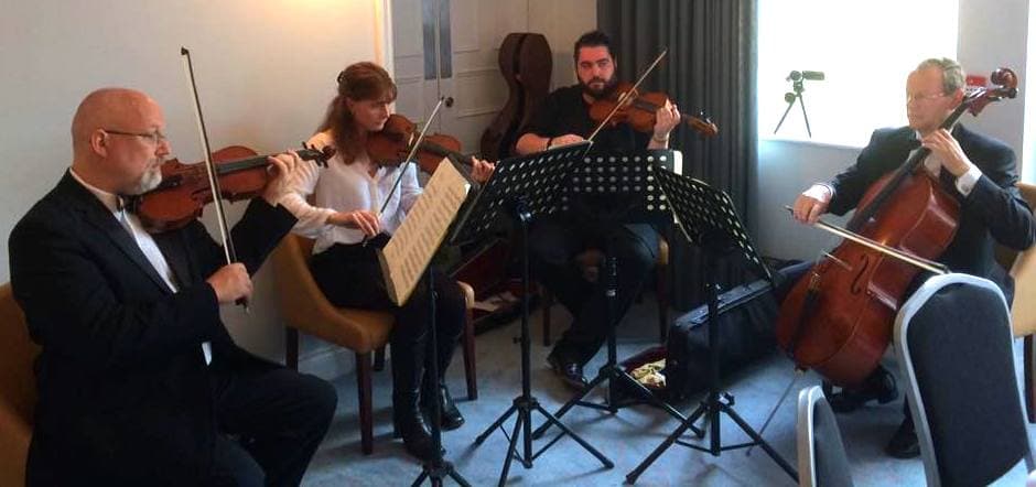 Four players in a string quartet