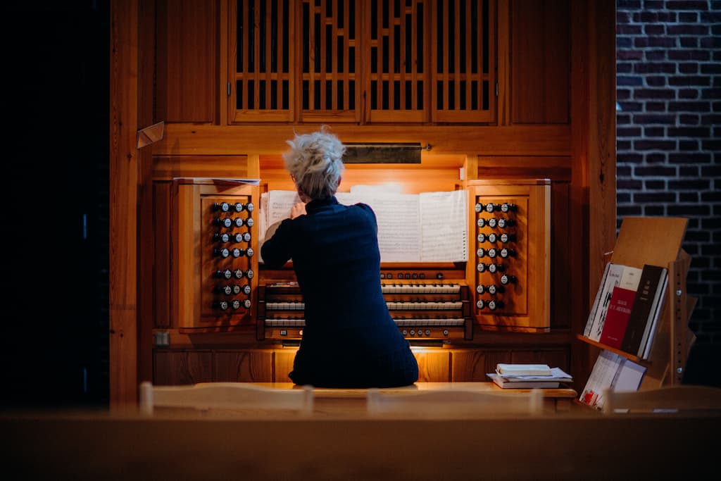 Organist seated at console